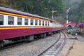 Train goes to red tunnel of Khun Tan station