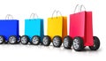 Train from group of paper shopping bags with car wheels Royalty Free Stock Photo