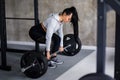 Train Hard Feel Good - Beautiful Fit Woman Doing Barbell Squats In The Gym. Active lifestyle Royalty Free Stock Photo