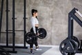 Train Hard Feel Good - Beautiful Fit Woman Doing Barbell Squats In The Gym. Active lifestyle Royalty Free Stock Photo