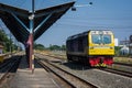 Train head on the rails of train station