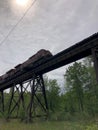 Train on high bridge in Eastern Townships Royalty Free Stock Photo