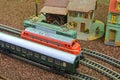 Train hobby models on the model railway. Close-up of model railway carriage on the rail tracks. Perfect model of the Royalty Free Stock Photo