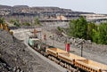 Train at the iron ore opencast mine is going for loading Royalty Free Stock Photo