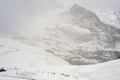 Train in Kleine Scheidegg under Eiger, Monch and Jungfrau peaks in Swiss Alps, Berner Oberland, Grindelwald,