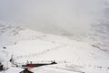 Train in Kleine Scheidegg under Eiger, Monch and Jungfrau peaks in Swiss Alps, Berner Oberland, Grindelwald,