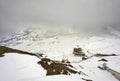 Train in Kleine Scheidegg under Eiger, Monch and Jungfrau peaks in Swiss Alps, Berner Oberland, Grindelwald,