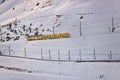 Train in Kleine Scheidegg under Eiger, Monch and Jungfrau peaks in Swiss Alps, Berner Oberland, Grindelwald,