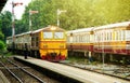Train led by Diesel Electric locomotives at Railway Station Thailand Royalty Free Stock Photo
