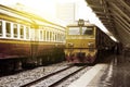 Train led by Old yellow Diesel Electric locomotives at Bangkok Railway Station Royalty Free Stock Photo