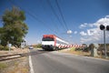 Train at level crossing Royalty Free Stock Photo