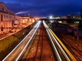 Train light lines in an industrial area Royalty Free Stock Photo
