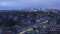 Train line in Chatswood NSW with Sydney city in background Time lapse twilight time