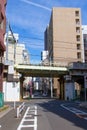 A train line runs right through the urban area of old Toko