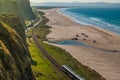 Train between Londonderry and Coleraine, one of the most beautiful rail journeys in the world. Royalty Free Stock Photo