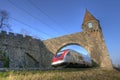 Train through medieval gate