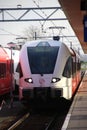 Train of the MerwedeLingelijn type spurt of Arriva waiting to leave