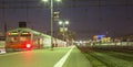 Train on Moscow passenger platform in Moscow, Russia at night Royalty Free Stock Photo