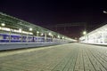 Train on Moscow passenger platform at night (Belorussky railway station) is one of the nine main railway stations in Moscow Royalty Free Stock Photo