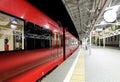 Train on Moscow passenger platform at night (Belorussky railway station) is one of the nine main railway stations in Moscow Royalty Free Stock Photo