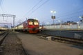 Train on Moscow passenger platform in Moscow, Russia at night Royalty Free Stock Photo