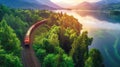 A train moves along tracks surrounded by dense, green foliage in a vibrant forest setting Royalty Free Stock Photo