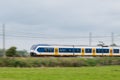 Train moving fast in landscape