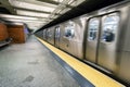 train on New York City subway with homeless sleeping