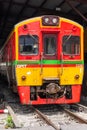 A train parked inside a train station. front view of train.