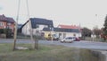 train passes houses in Poland in villages a short-range car that follows next is visible from the window Old villages