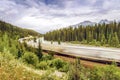 Train passing by Banff National Park, Alberta, Canada Royalty Free Stock Photo