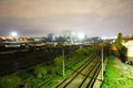 Night scene of rails and train in Carpati station, Bucharest, CFR