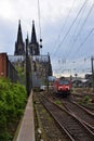 Train passing by Cologne Cathedral, Germany