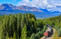 Train passing famous Morant`s curve in Banff ,Canada