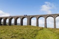 Train passing over the Ribblehead Viaduct