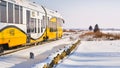 A train passing on a railroad on a winter day through a snowy landscape
