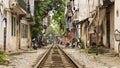 train passing through streets of hanoi slums, vietnam Royalty Free Stock Photo