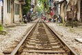 train passing through streets of hanoi slums, vietnam Royalty Free Stock Photo