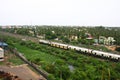 Train Passing through Suburbs of Chennai, India Royalty Free Stock Photo