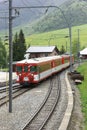 Train passing a village Royalty Free Stock Photo