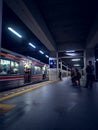 Train people chair waiting opendoor standing yellow terminal railway 8 lamp night mask jakarta twitter Royalty Free Stock Photo