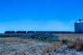 Train picking up grain. Charmangay, Alberta, Canada