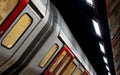 Train on the platform at Euston Square Underground Station, London UK, showing reflection of train on ceiling above. Royalty Free Stock Photo