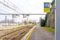 train platform with a yellow line so that passengers do not pass at risk of falling onto the line. Royalty Free Stock Photo