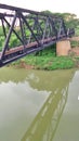 Train pratt truss steel bridge over Pasak river Thailand