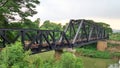 Train pratt truss steel bridge over Pasak river Thailand