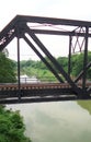 Train pratt truss steel bridge over Pasak river Thailand