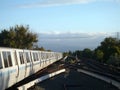 Train pulls into Concord BART Station during the day Royalty Free Stock Photo