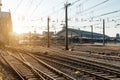 Train railroad tracks at Europe major train station at sunrise.