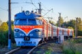 The train is on the rails in the evening. railway. Electric train Russia, Leningrad region, Gatchina, August 8, 2018